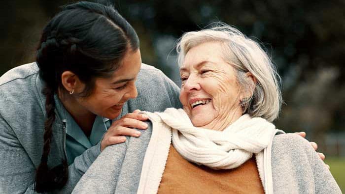 IHSS caregiver helping patient in Glendale
